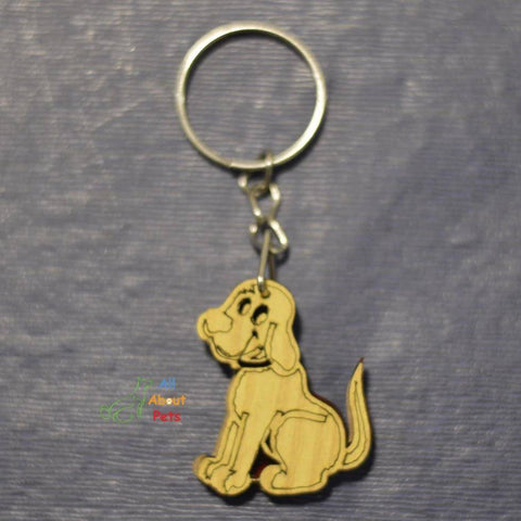 Image of Key Chain Wooden Carved dog shape available at allaboutpets.pk in pakistan.