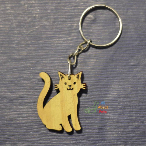 Image of Key Chain Wooden Carved cat shape available at allaboutpets.pk in pakistan.