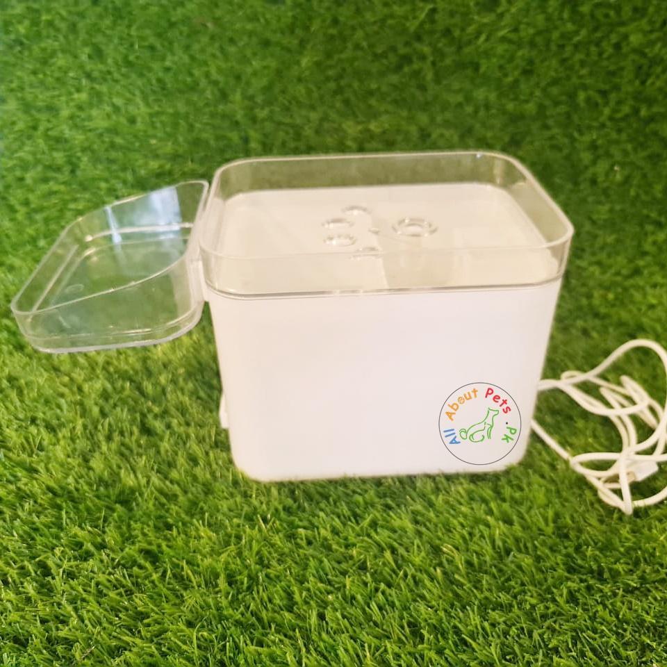 Pet Water Fountain with Feeding Tray available at allaboutpets.pk in Pakistan