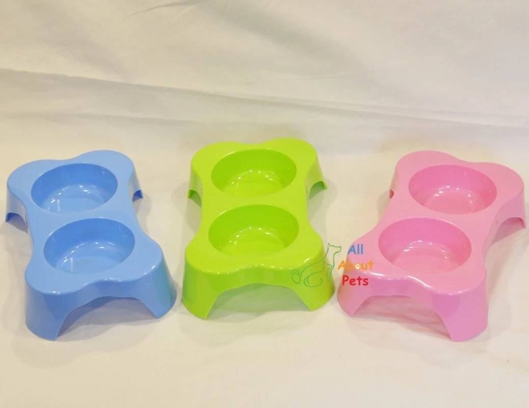 Dog Bone Shape Double Bowl, cat feeding bowl, dog feeding bowl, green pet feeding bowl, pink pet feeding bowl, blue pet feeding bowl available at allaboutpets.pk in pakistan.
